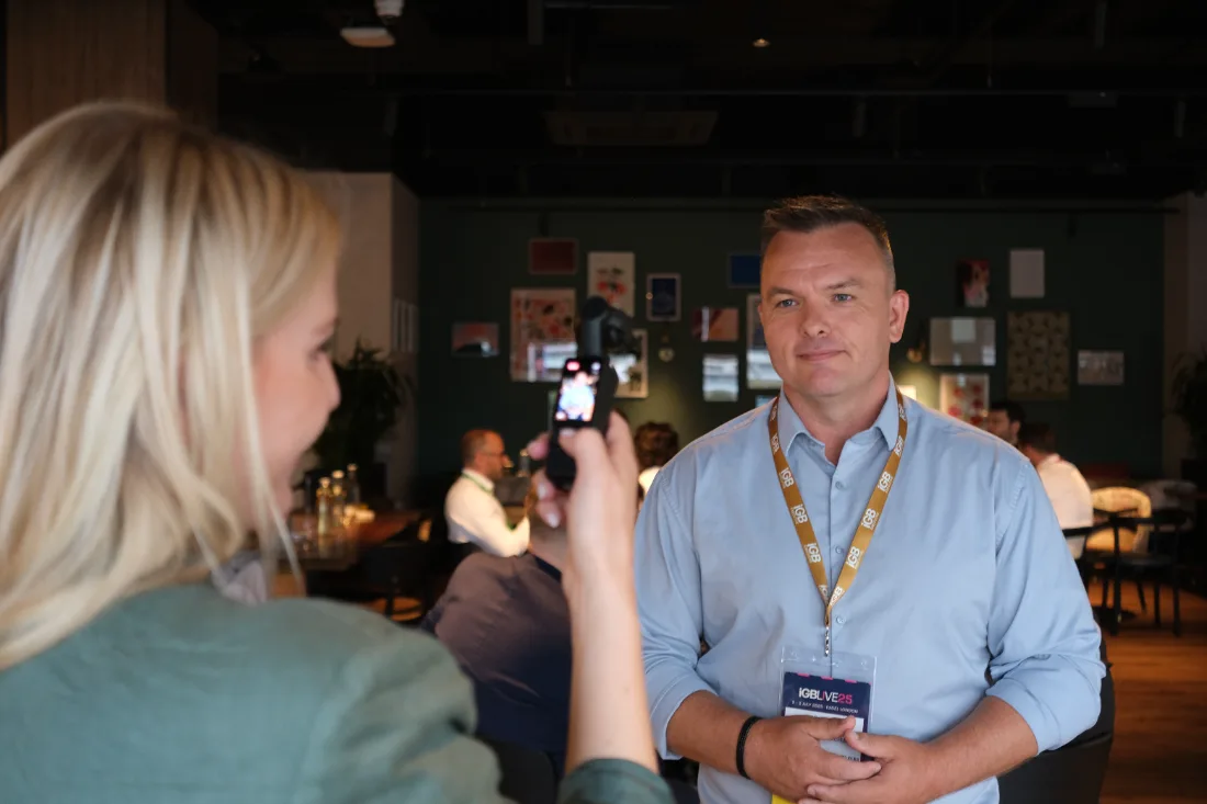 Leo Judkins being filmed for an interview at an industry conference
